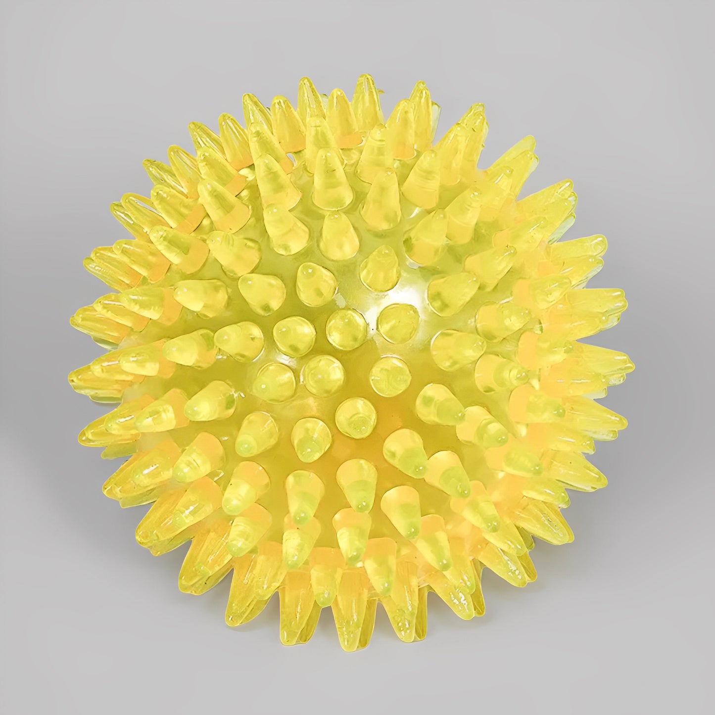 Squeaky Polka Dog Ball in yellow color