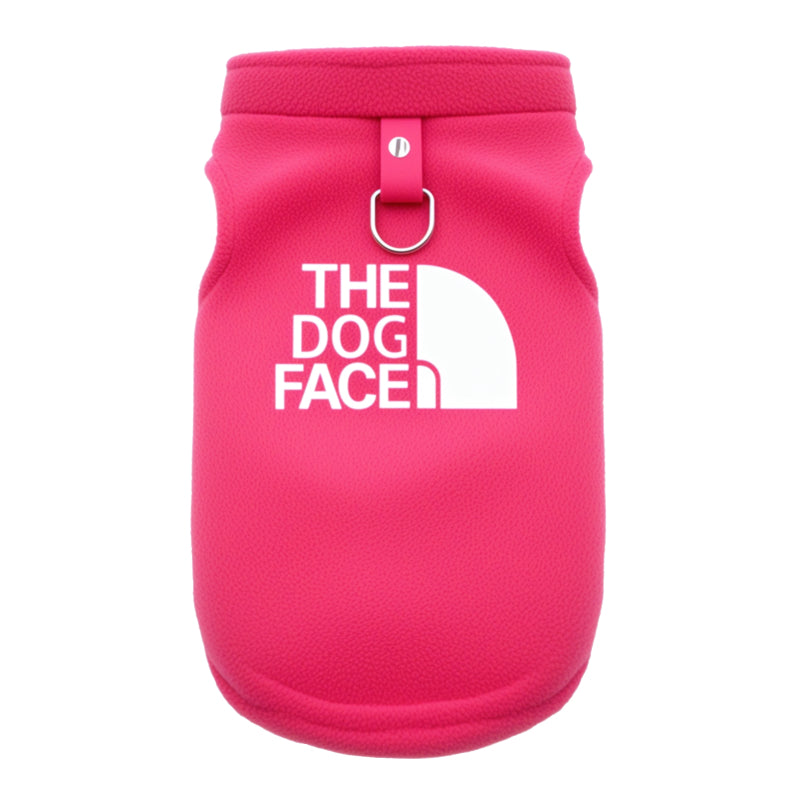 Pink dog coat with 'The Dog Face' logo on a white background