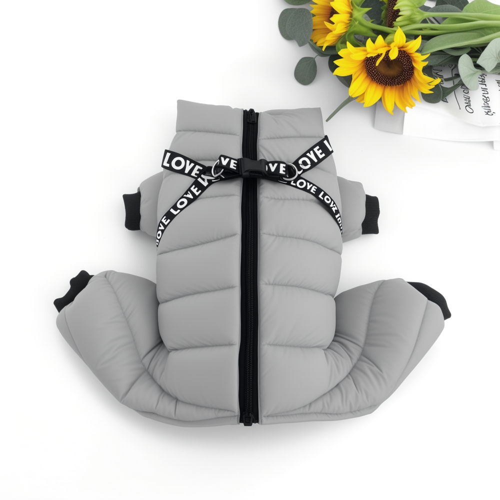 Gray pet vest with a black strap on a white background with sunflowers.