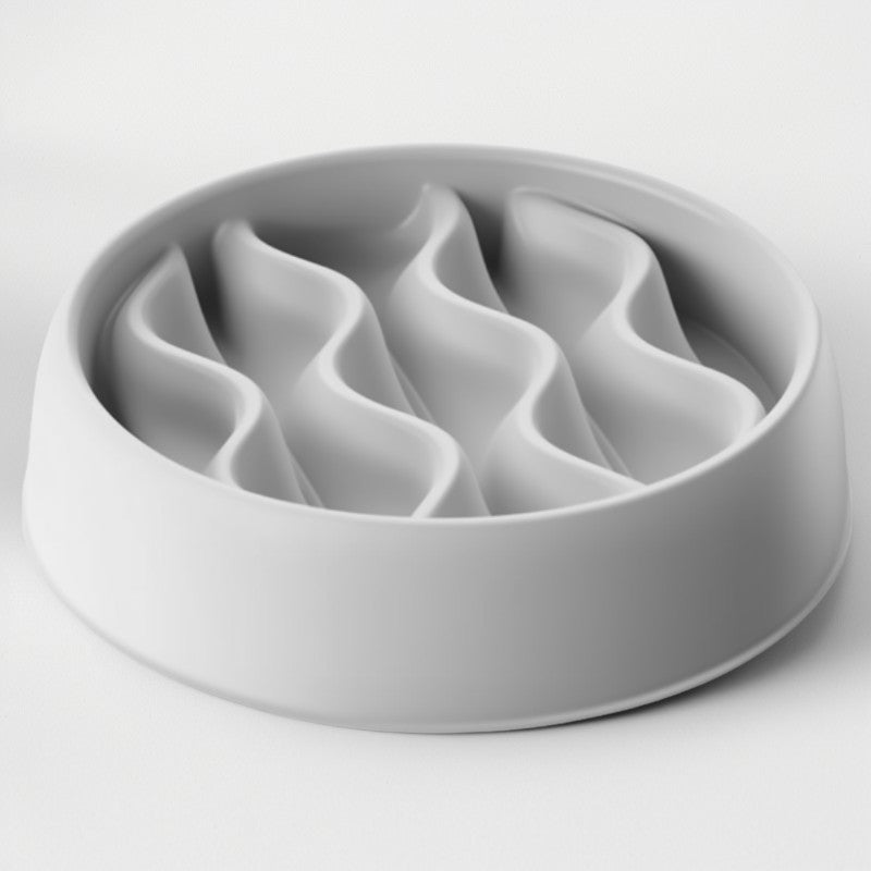 Gray ceramic bowl with wavy design on a white background