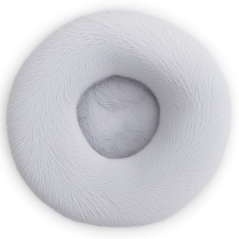 Light grey round calming pet bed, ultra-soft plush and washable, perfect for small to medium pets.
