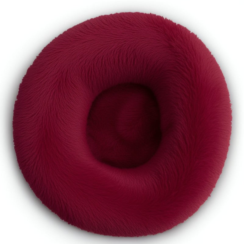 Red wine plush donut pet bed for dogs and cats, calming design for warmth and comfort.