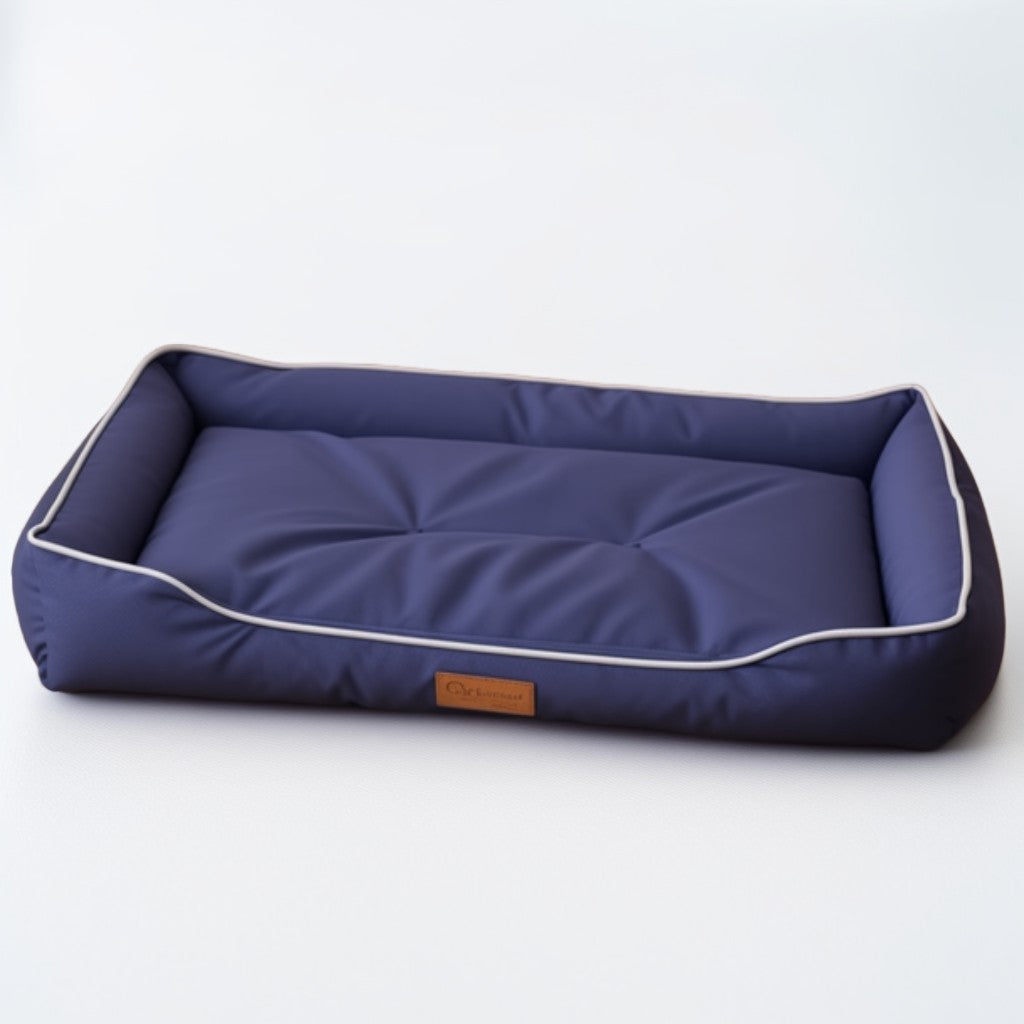 Navy blue waterproof dog bed with thick cushioned bolsters and minimalist design.