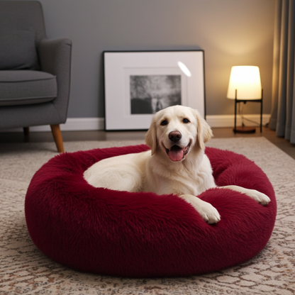 Dog lying on a red fluffy pet bed in a cozy living room.