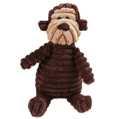 Brown plush dog toy with a white face on a white background