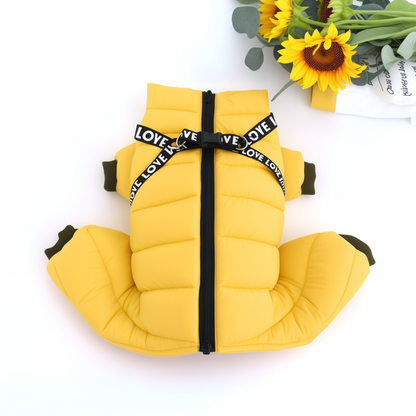 Yellow pet vest with black straps on a white background with sunflowers.