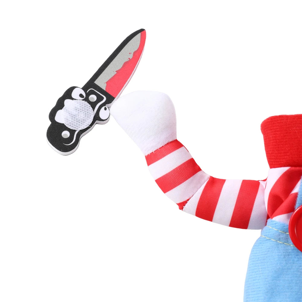 Toy arm with red and white striped sleeve holding a toy knife on a white background