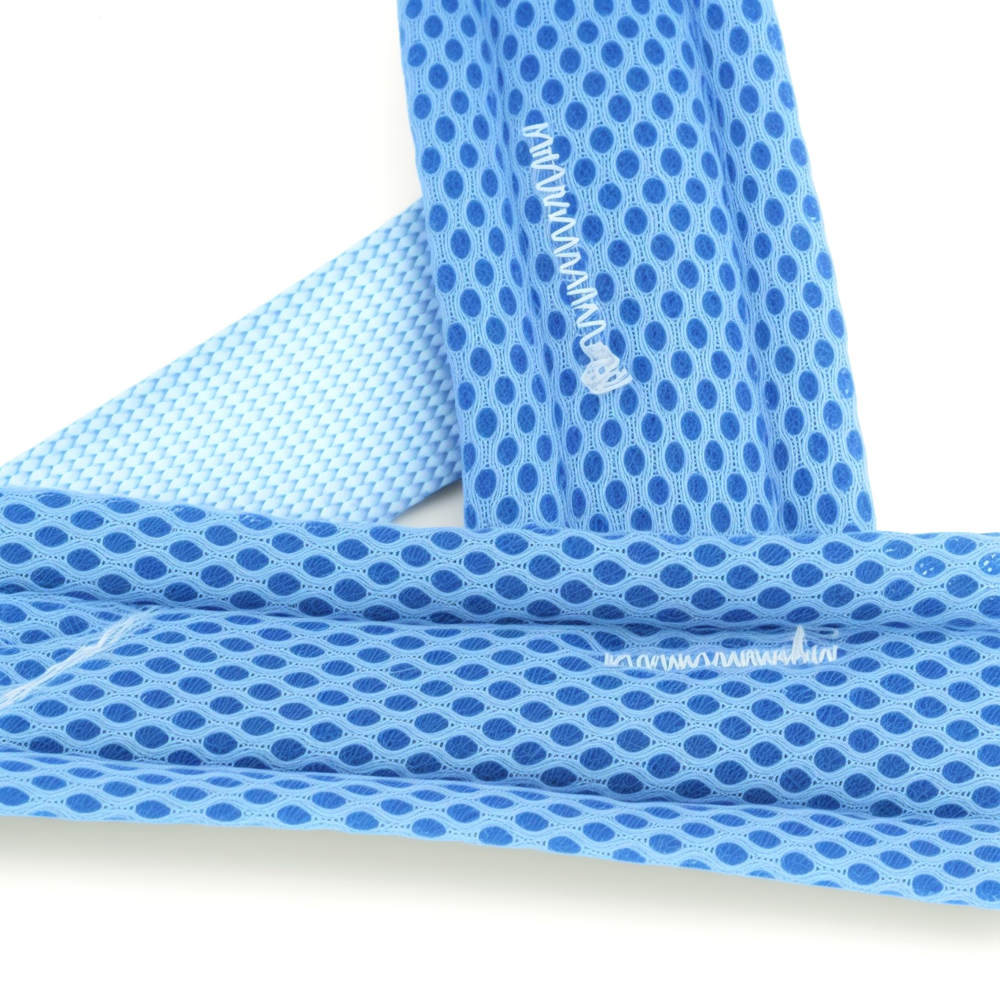 Close-up of breathable blue mesh fabric used in Barkie dog harness