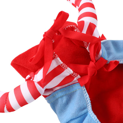Close-up of a red and white striped candy cane with blue fabric and a bow on a white background