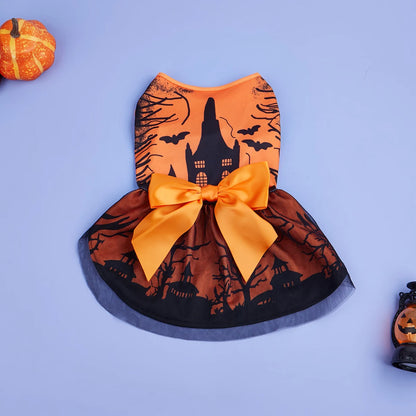 Halloween-themed pet dress with orange and black design on a blue background