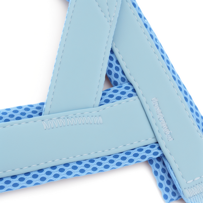 Detailed view of reinforced stitching and PU leather on dog harness strap