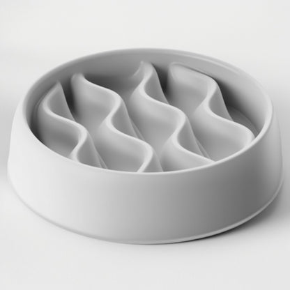 Gray ceramic bowl with wavy design on a white background