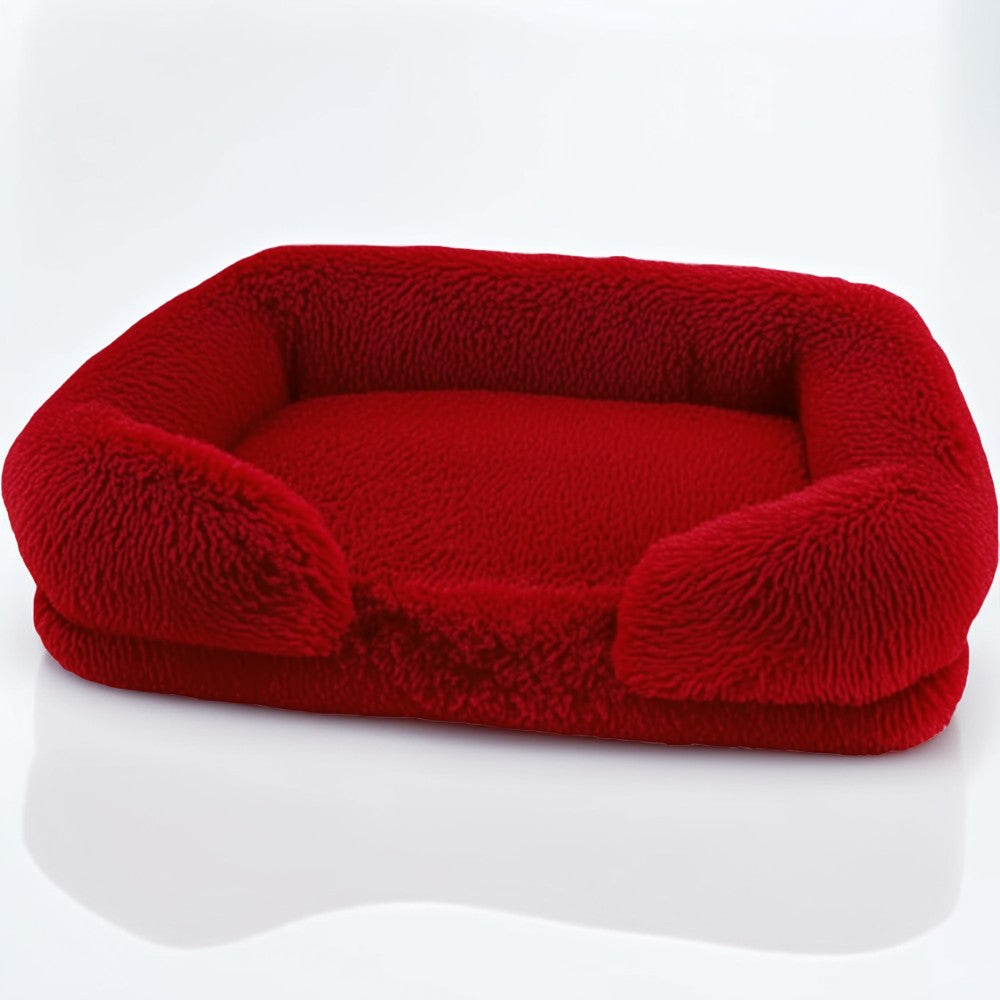 Red sofa-style plush dog bed — rectangular pet sofa with bolsters, ultra-soft PV plush and machine-washable cover.