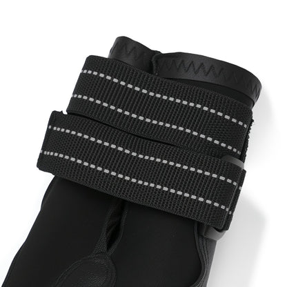 Black glove with reflective straps on a white background
