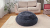 Close-up of anti-slip and waterproof bottom of calming round pet bed, ensuring durability and stability.